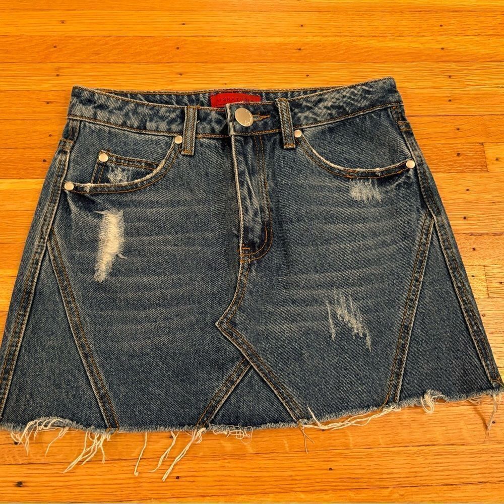 Signature 8 denim ripped mini skirt